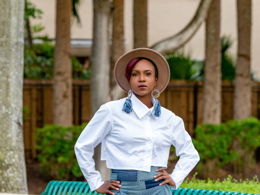 White asymmetrical crop shirt blouse with buttons slightly to the side instead of centre front