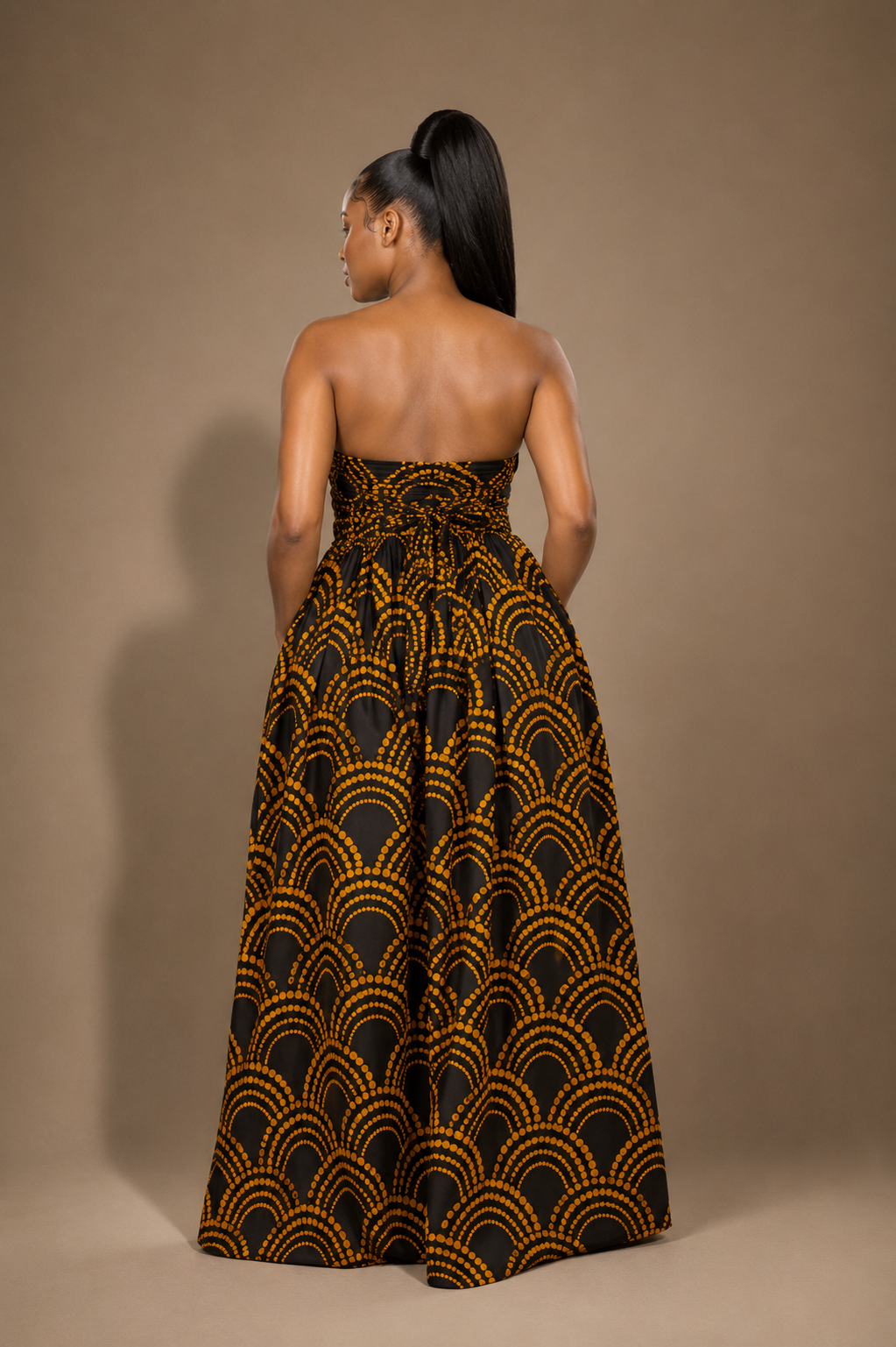 Luxury convertible multi wrap infinity maxi dress by Marlene Simone with gathered waist, flowing A-line skirt, and hidden pockets. Back view