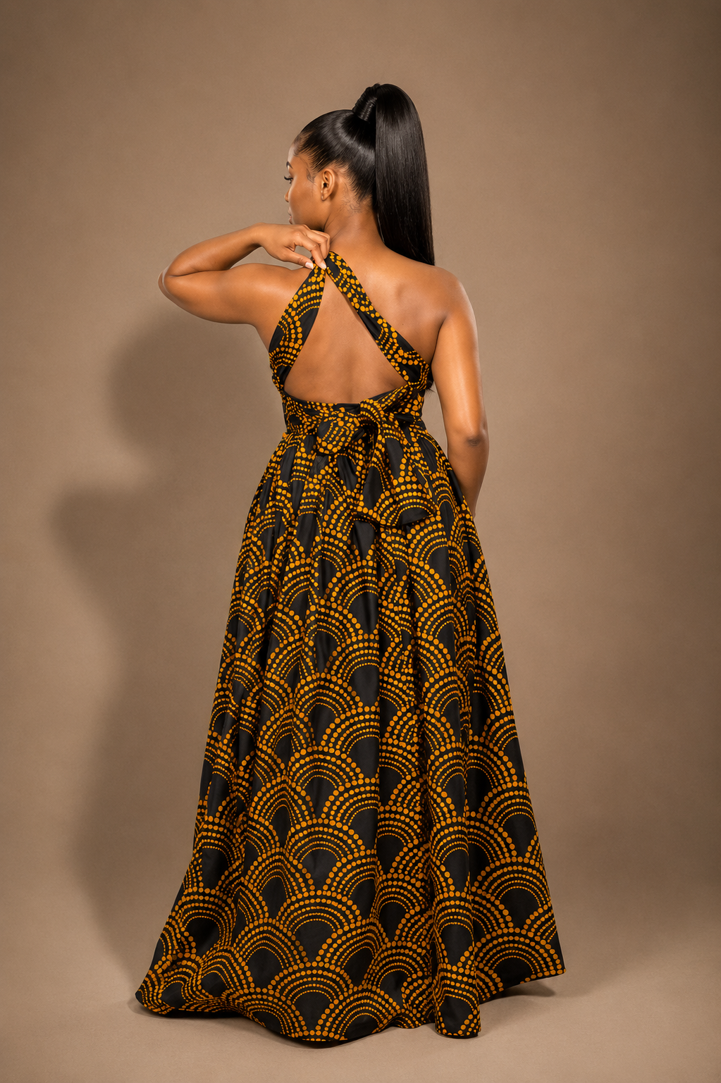 Luxury convertible multi wrap infinity maxi dress by Marlene Simone with gathered waist, flowing A-line skirt, and hidden pockets. Back view