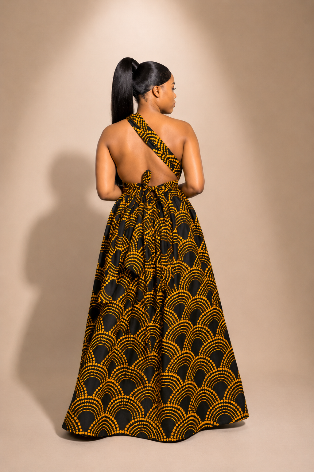 Luxury convertible multi wrap infinity maxi dress by Marlene Simone with gathered waist, flowing A-line skirt, and hidden pockets. back view