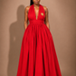 Luxury red convertible infinity maxi dress by Marlene Simone with halter neckline, gathered waist, flowing A-line skirt, and hidden pockets.