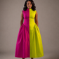 Elegant color block fit and flare midi dress for women featuring a high neckline, fitted bodice, gathered skirt, and modest silhouette by Marlene Simone.